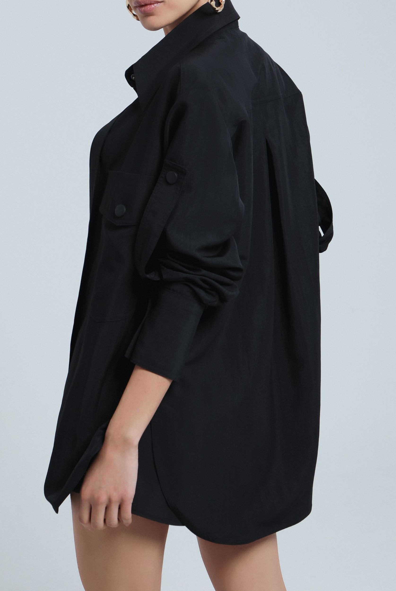 Lightweight oversized shirt styled for layering or solo wear
