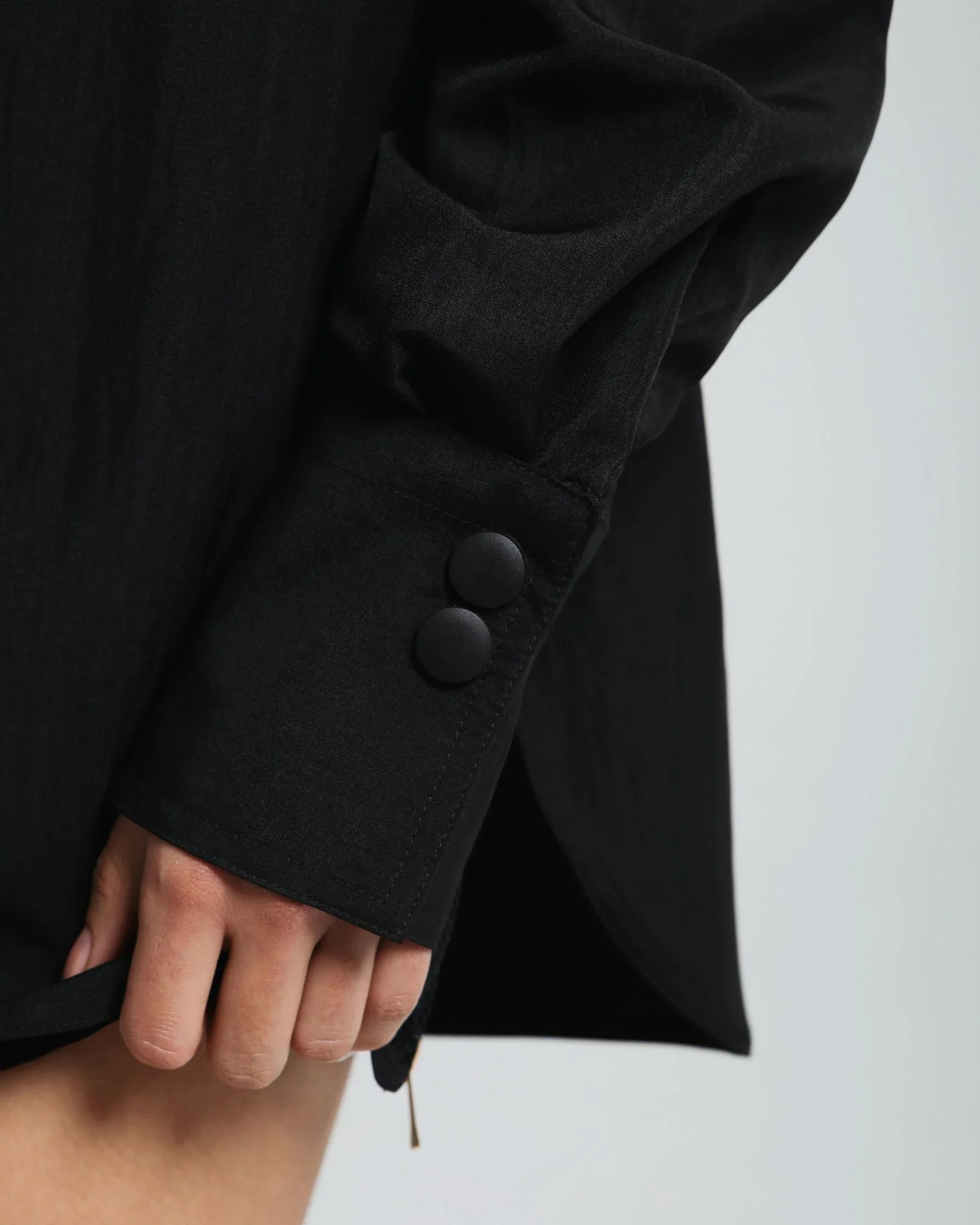 Lightweight oversized shirt styled for layering or solo wear