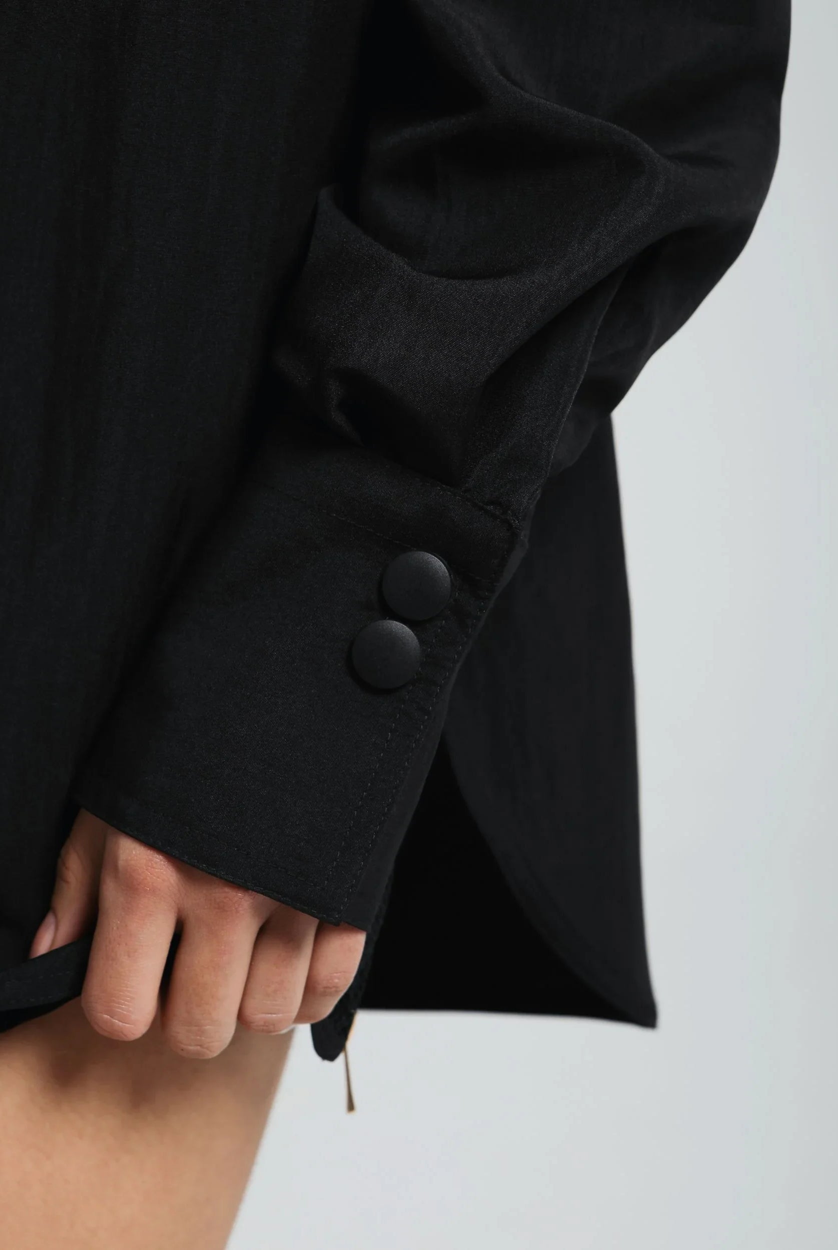 Lightweight oversized shirt styled for layering or solo wear