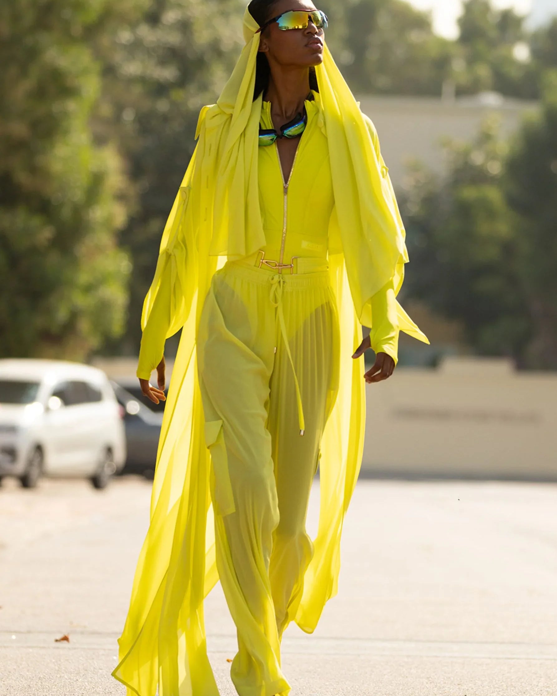 Lightweight sheer pants styled as swimwear cover-up for summer nights
