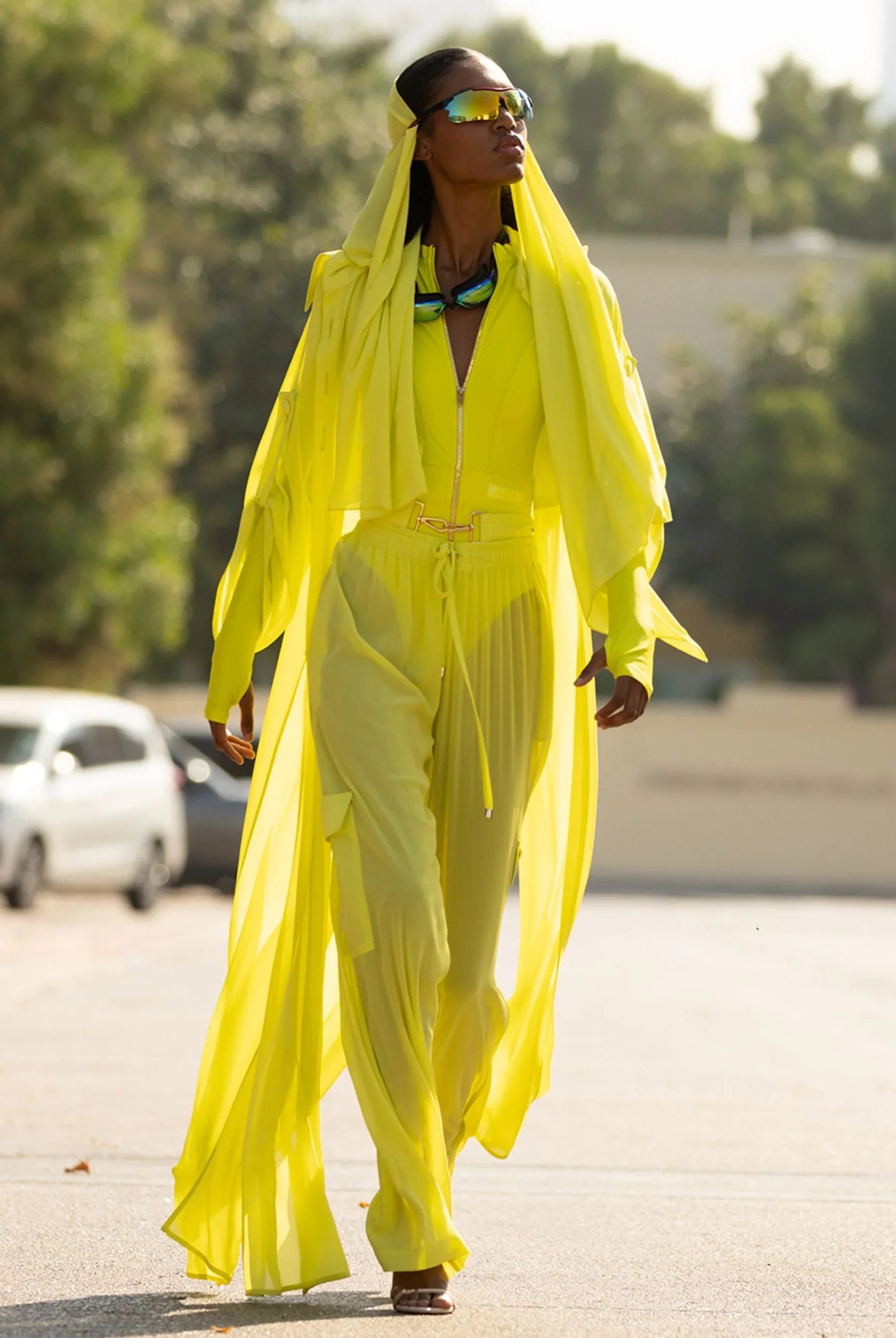 Lightweight sheer pants styled as swimwear cover-up for summer nights