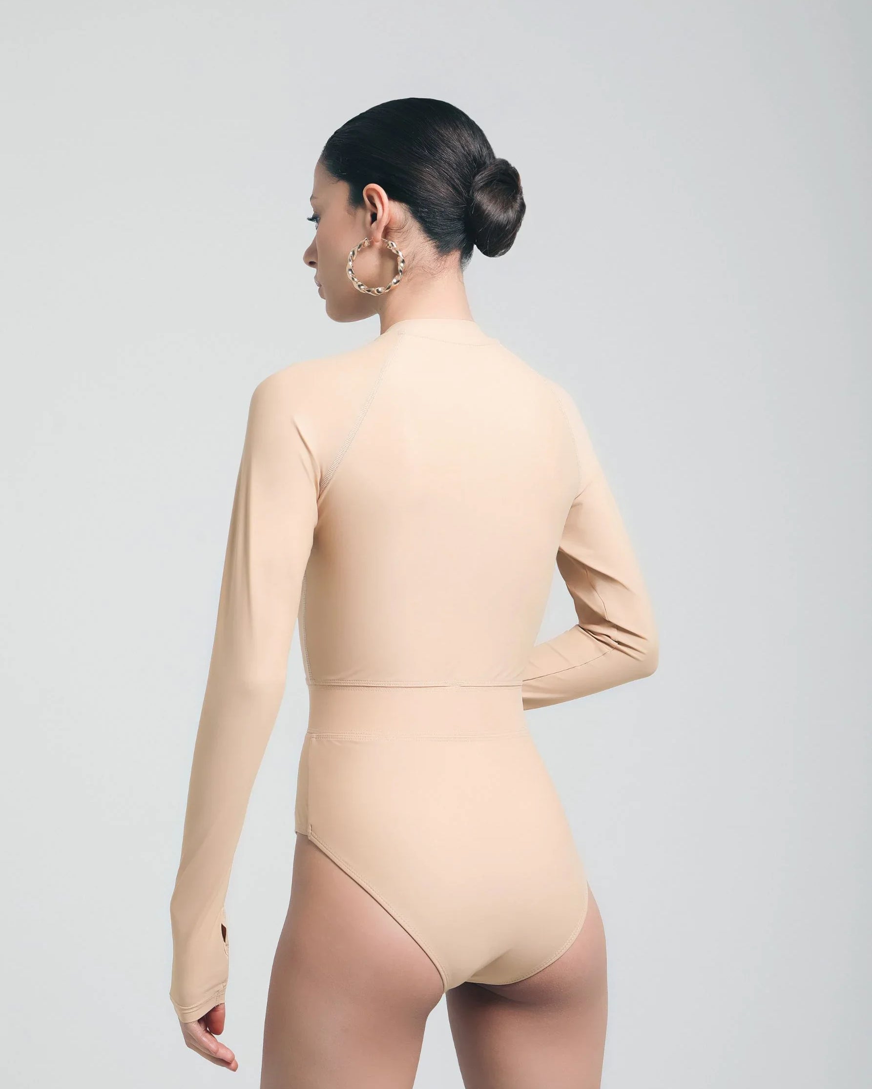 UV-protected one-piece swimwear with thumb holes and sleek design