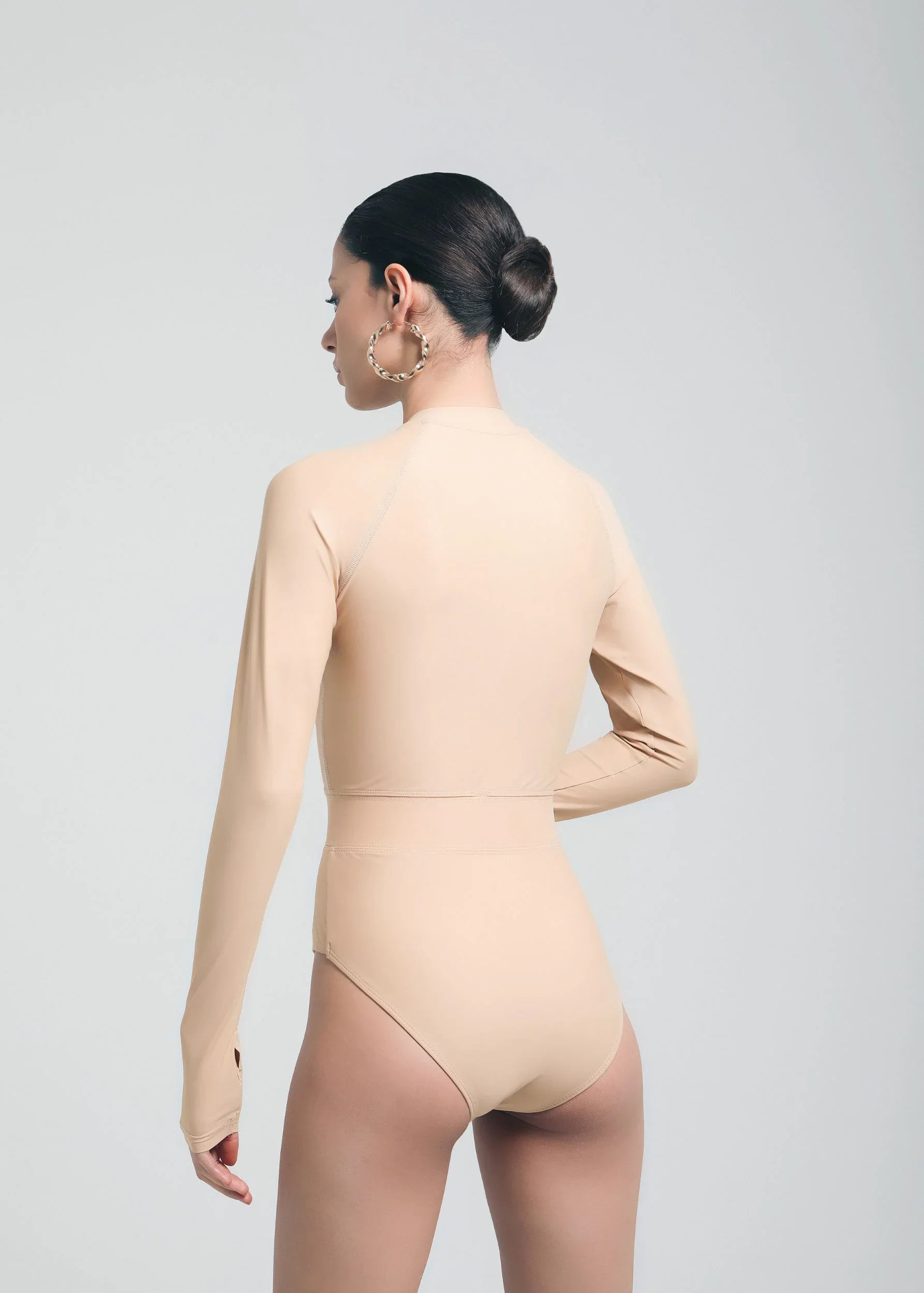 UV-protected one-piece swimwear with thumb holes and sleek design