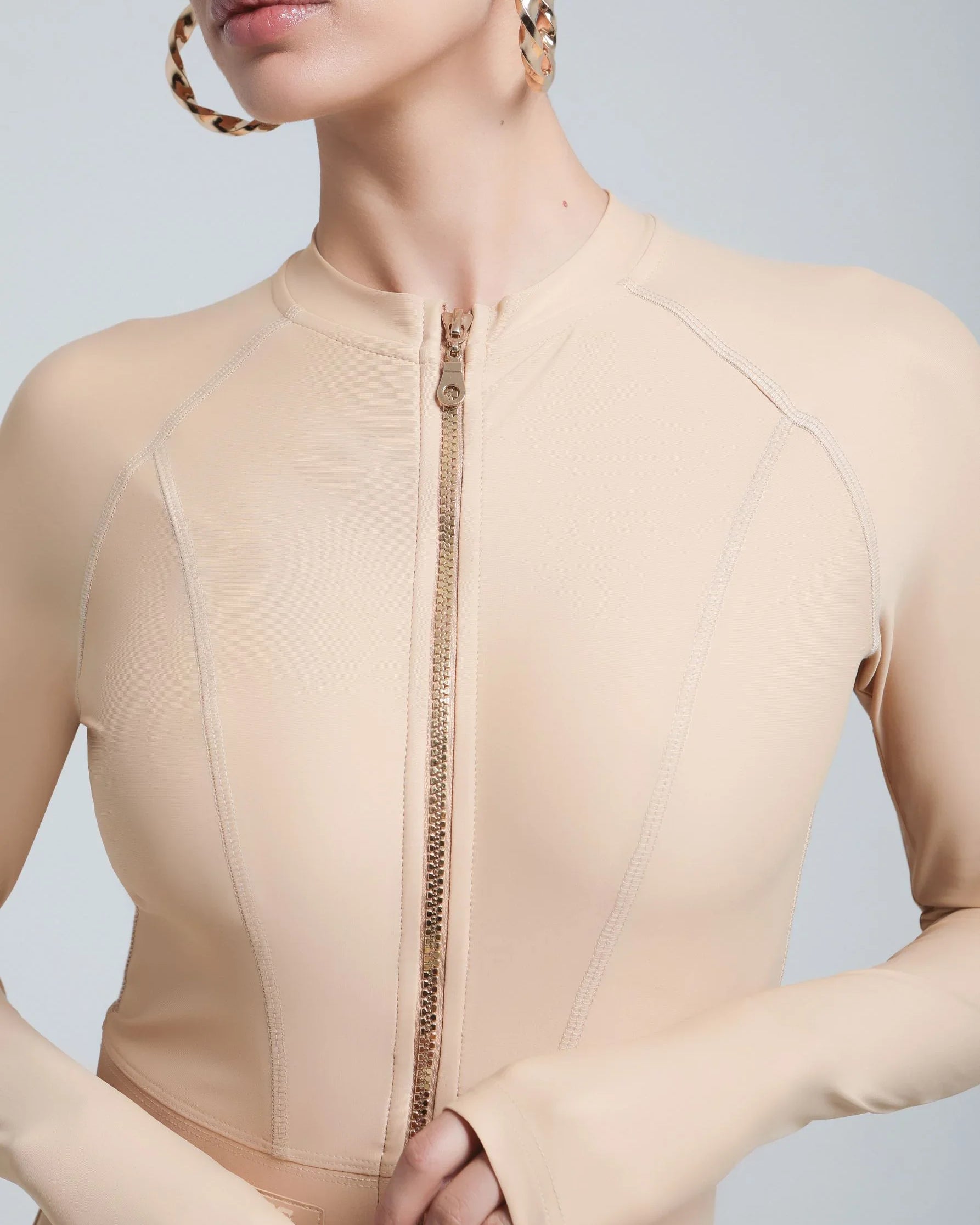 UV-protected one-piece swimwear with thumb holes and sleek design