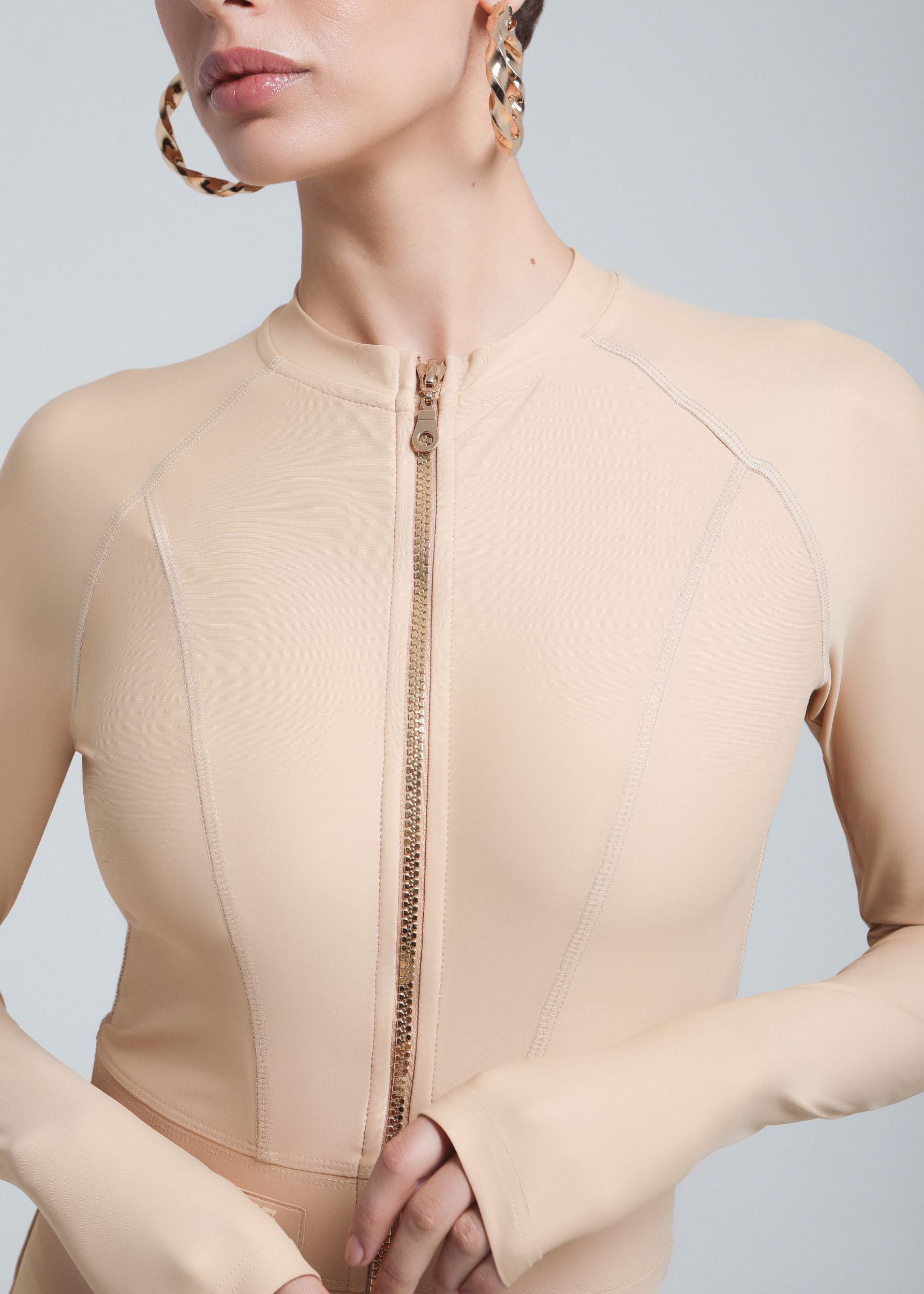 UV-protected one-piece swimwear with thumb holes and sleek design