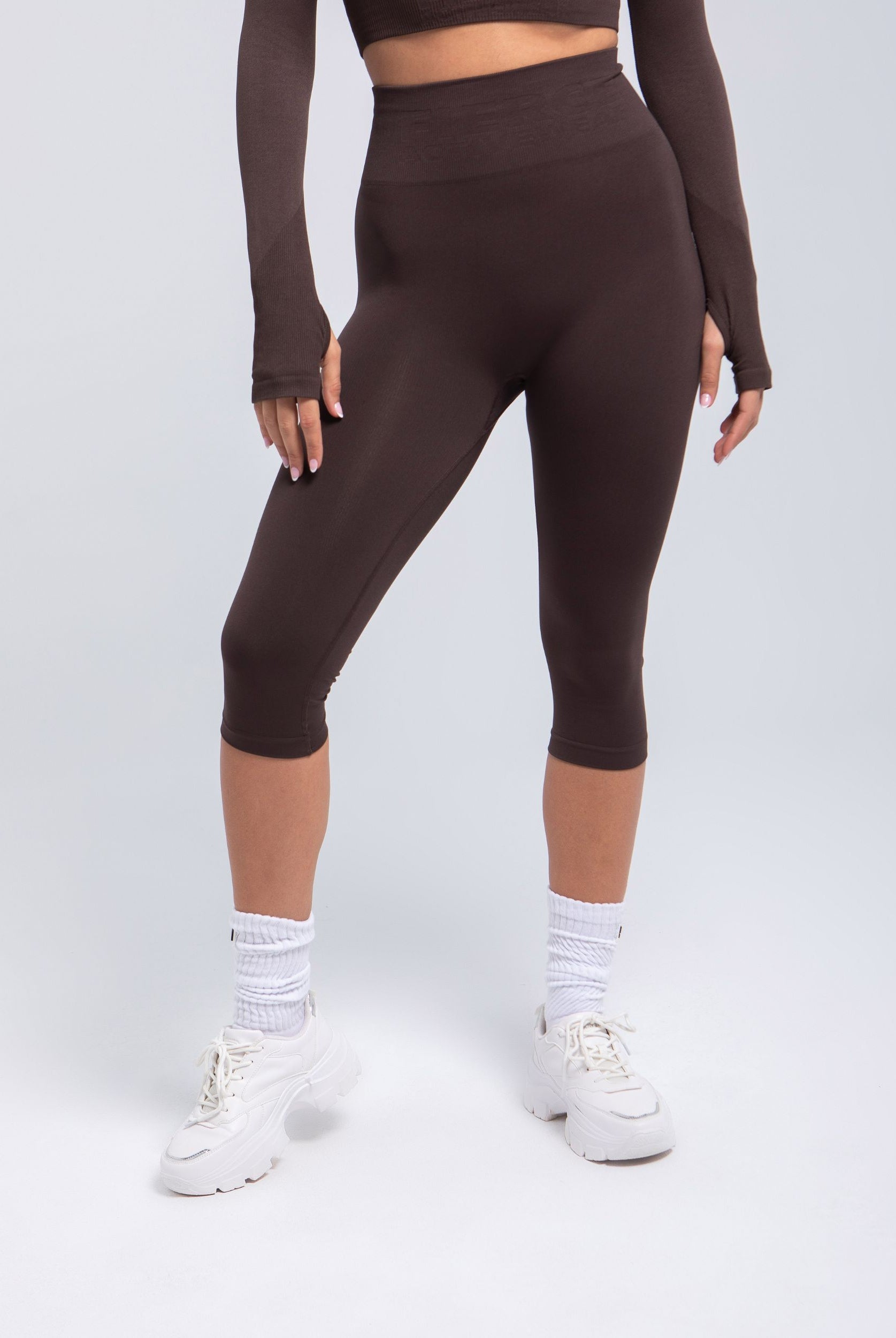 Espresso seamless high-waist capri leggings front view with sculpting waistband