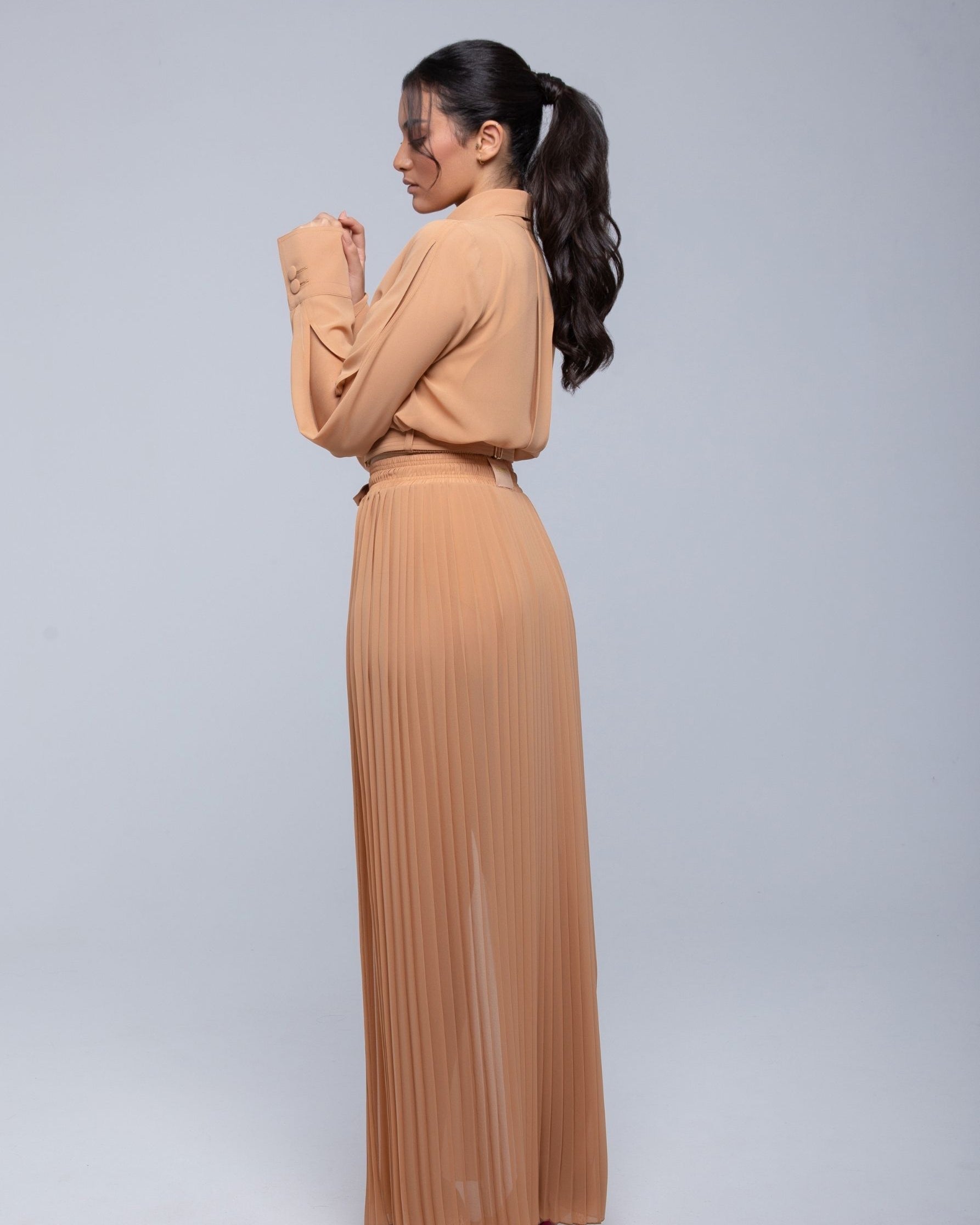 Sheer Jacket with button front, sleeve slits, and gold-accented belt