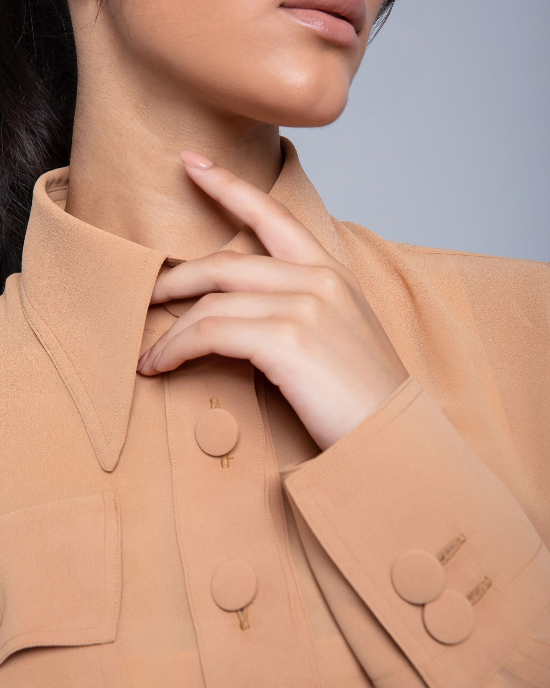 Sheer Jacket with button front, sleeve slits, and gold-accented belt