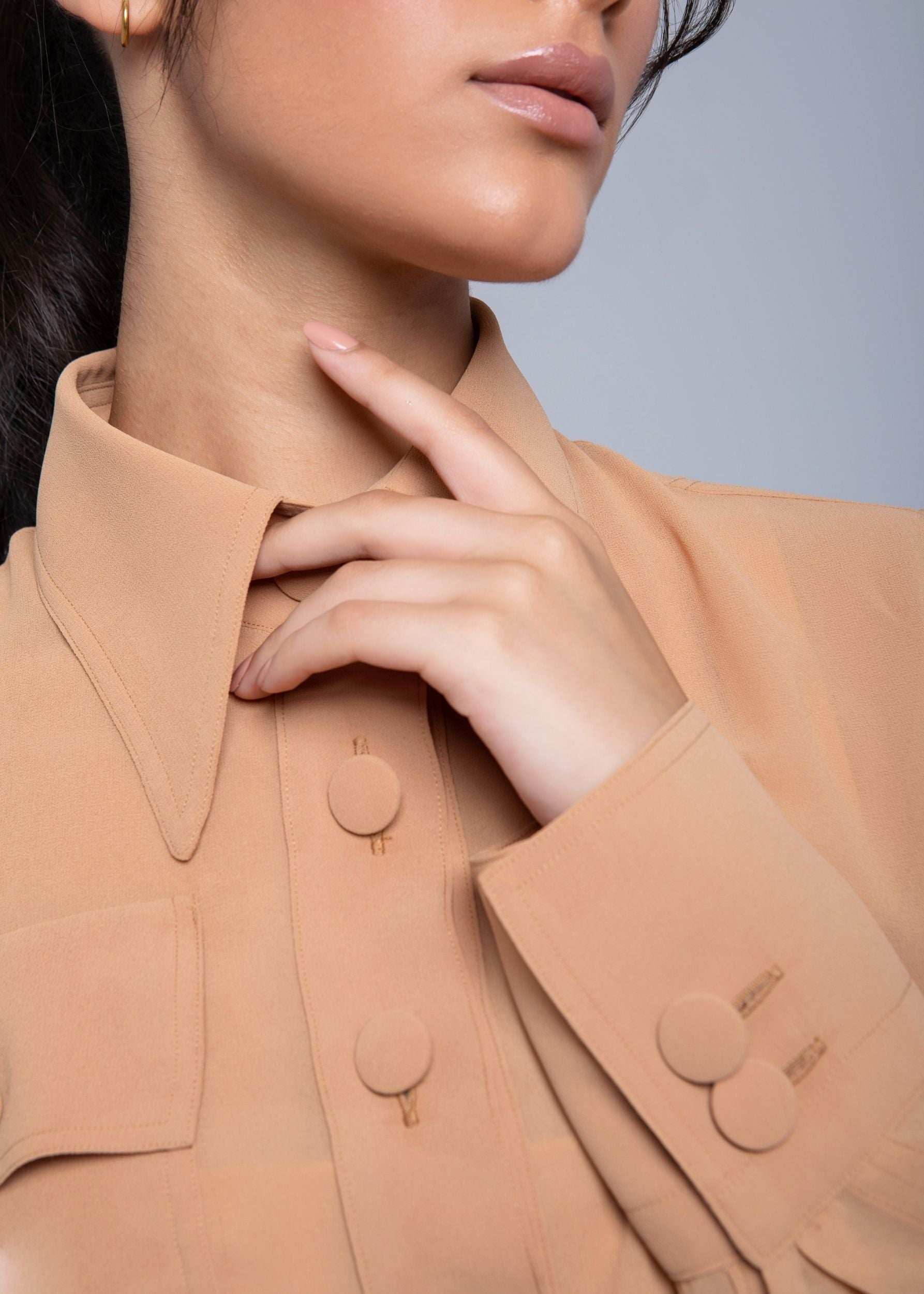 Sheer Jacket with button front, sleeve slits, and gold-accented belt