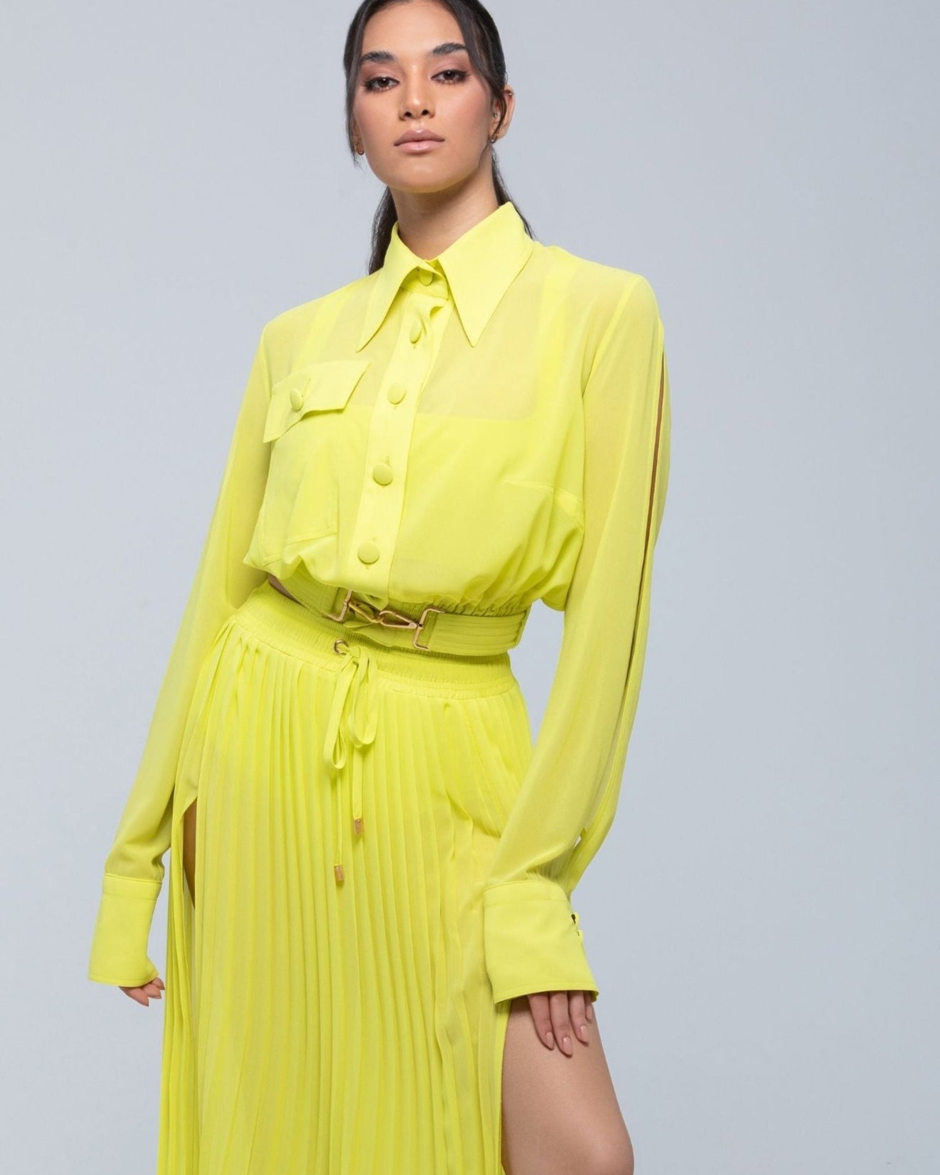 Sheer Jacket with button front, sleeve slits, and gold-accented belt