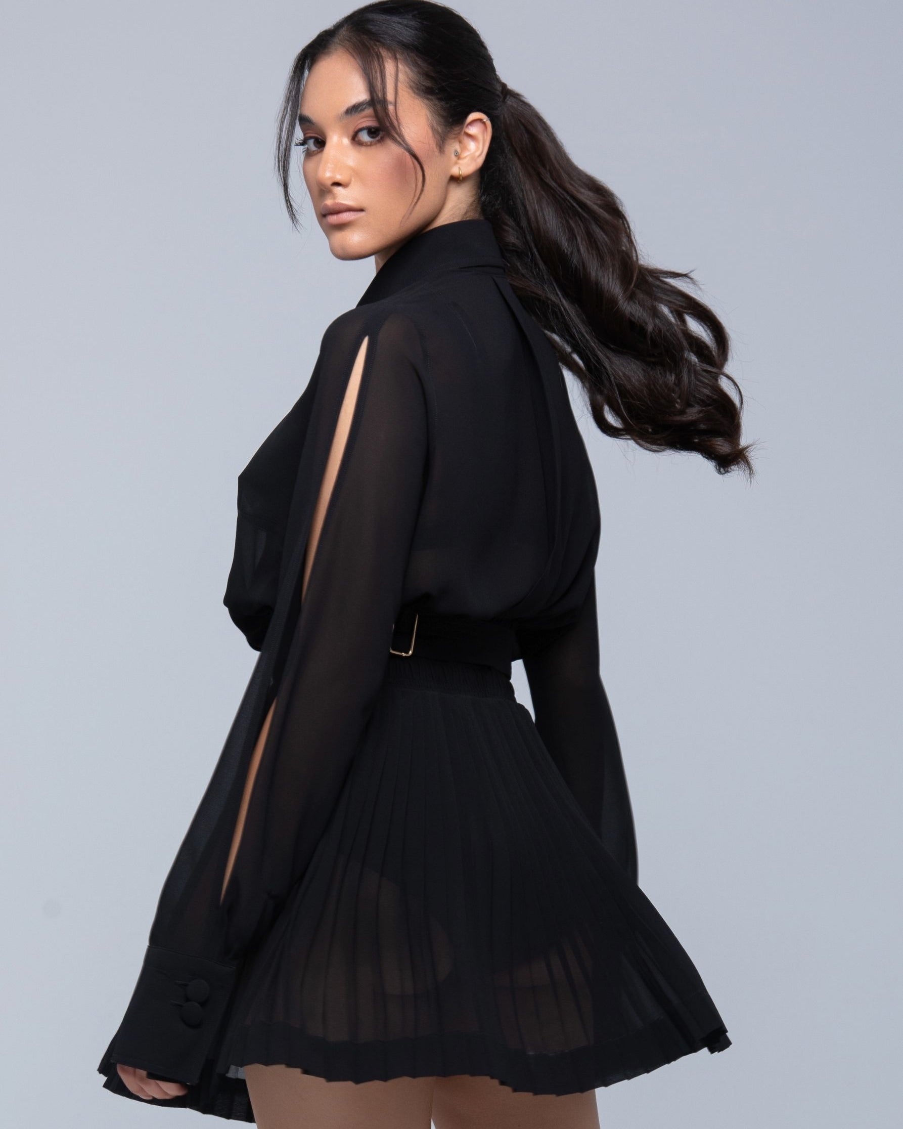 Sheer Jacket with button front, sleeve slits, and gold-accented belt