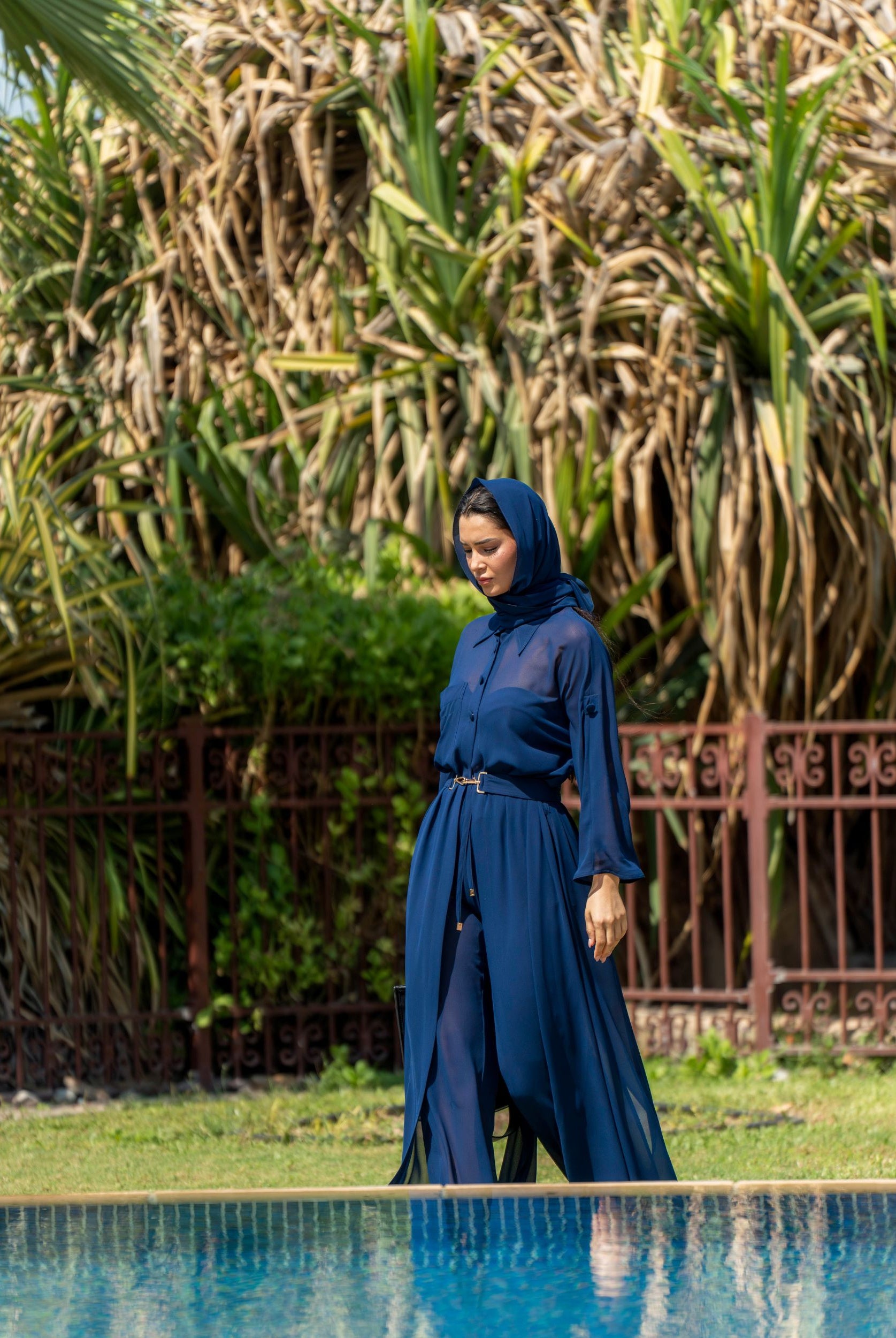 Sheer Maxi Shirt with gold-accented belt and adjustable sleeves