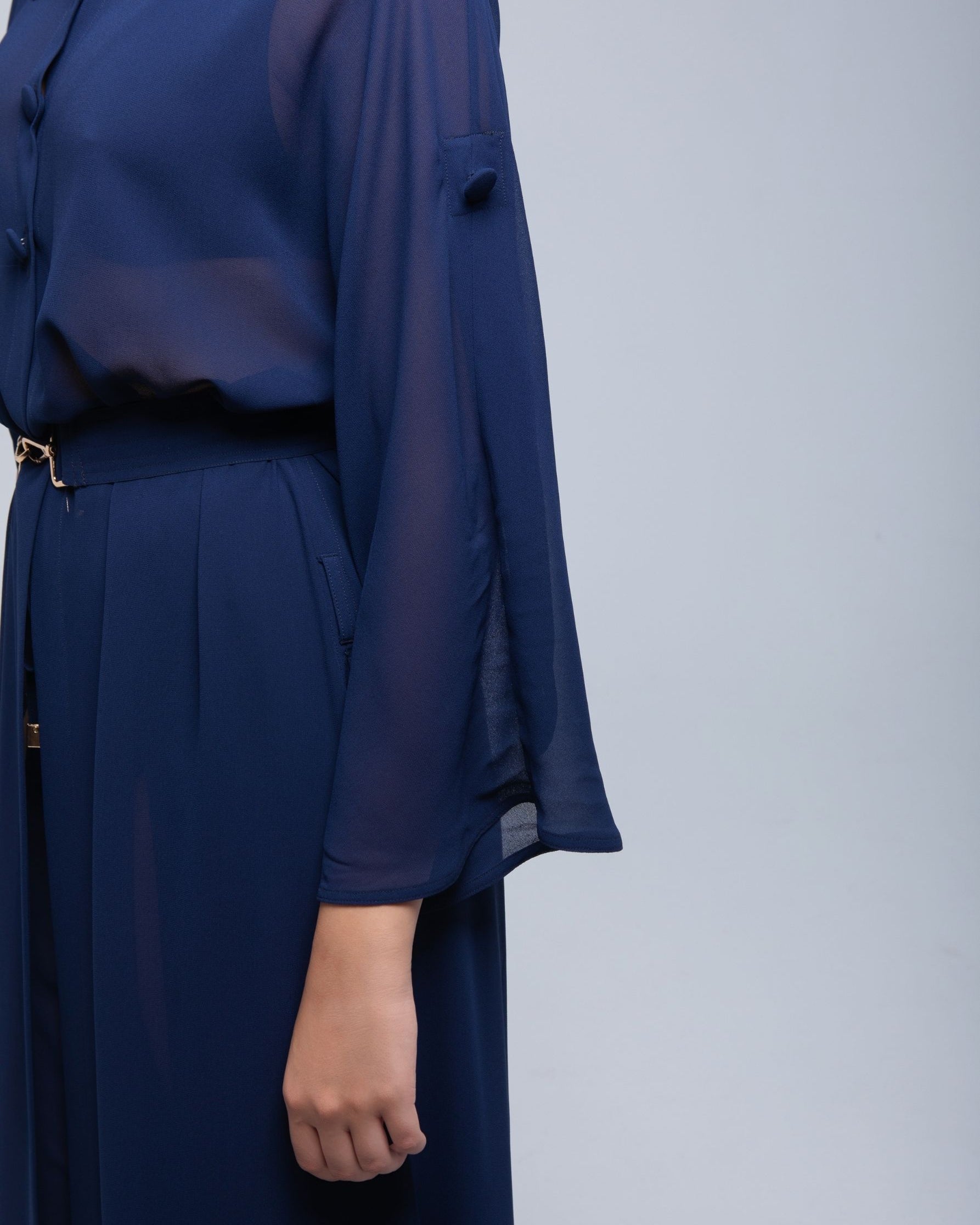 Sheer Maxi Shirt with gold-accented belt and adjustable sleeves