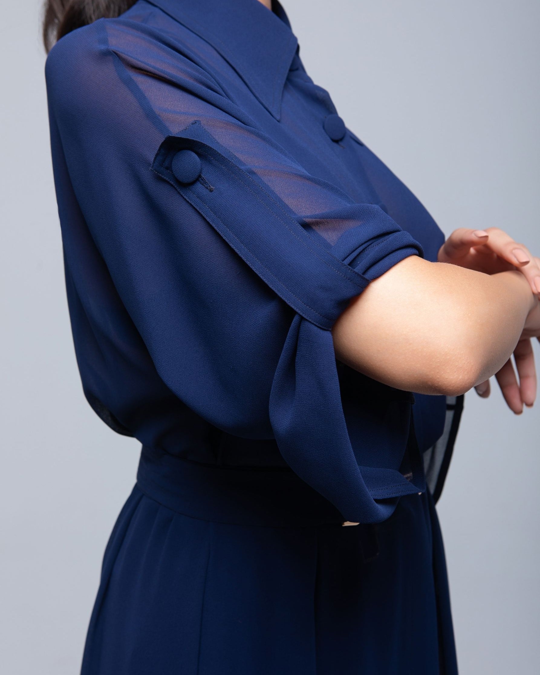 Sheer Maxi Shirt with gold-accented belt and adjustable sleeves
