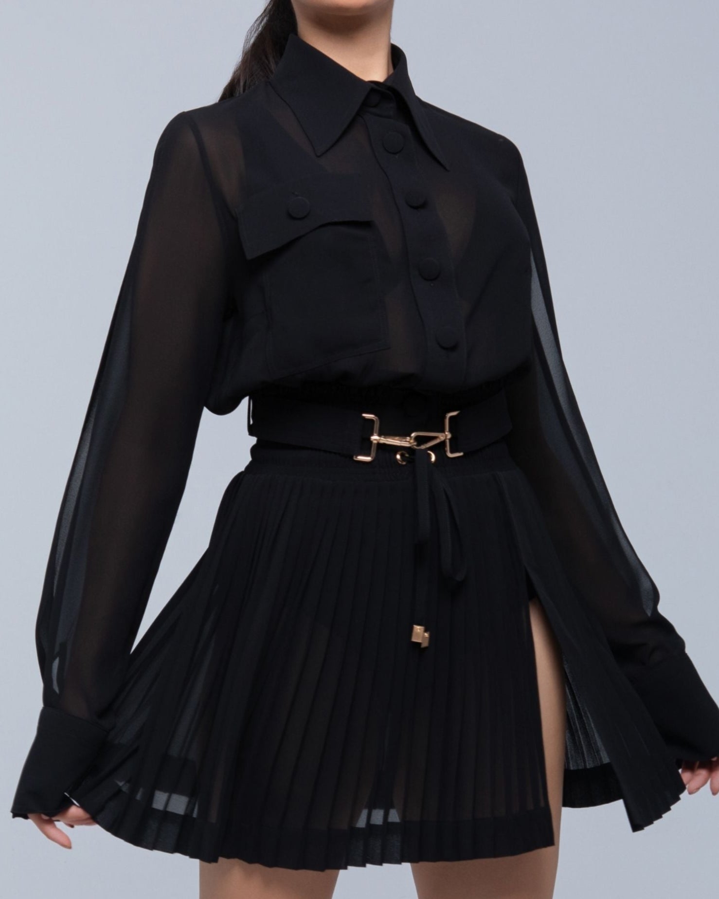 Sheer mini skirt with pleated lightweight fabric and one-side slit