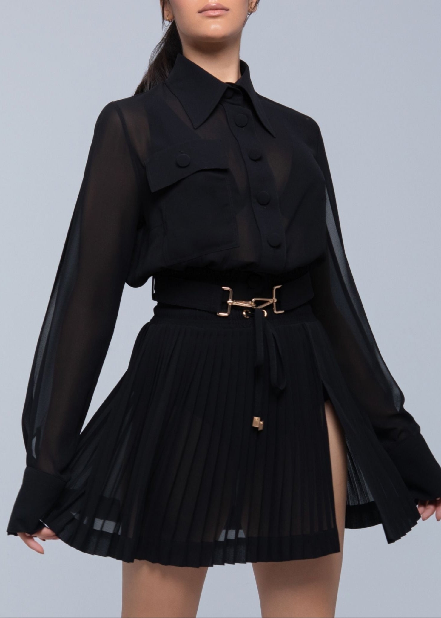 Sheer mini skirt with pleated lightweight fabric and one-side slit