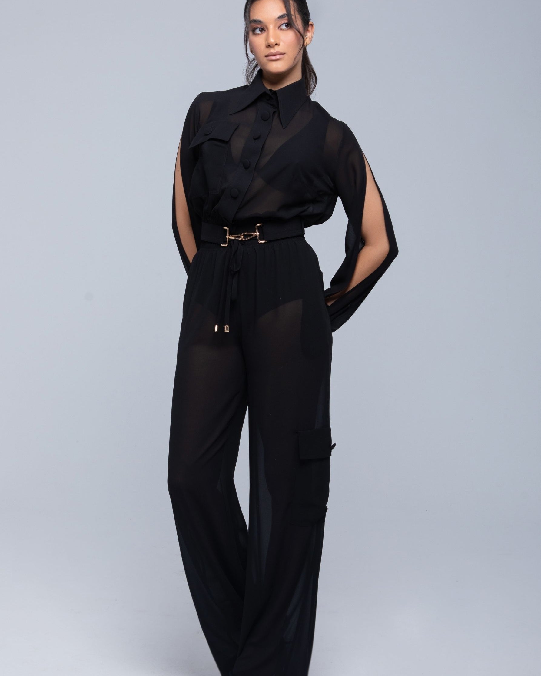 Lightweight sheer pants styled as swimwear cover-up for summer nights