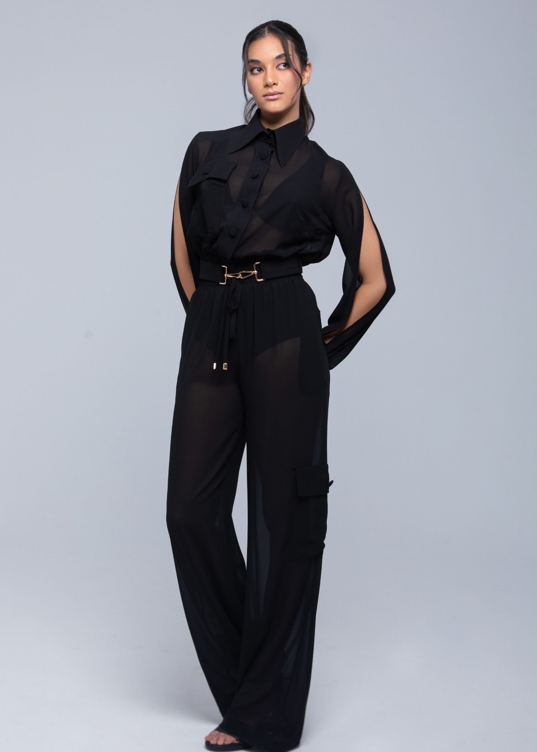 Lightweight sheer pants styled as swimwear cover-up for summer nights