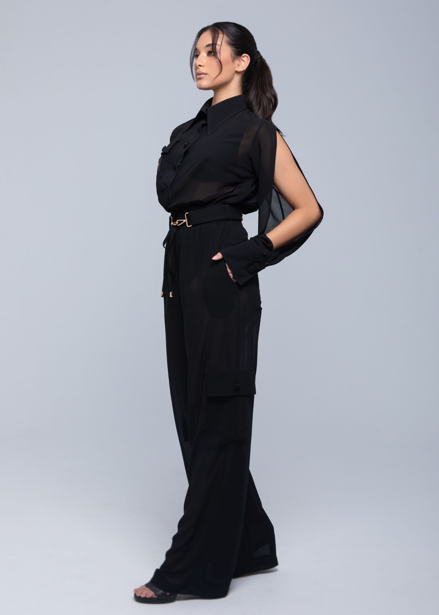 Lightweight sheer pants styled as swimwear cover-up for summer nights