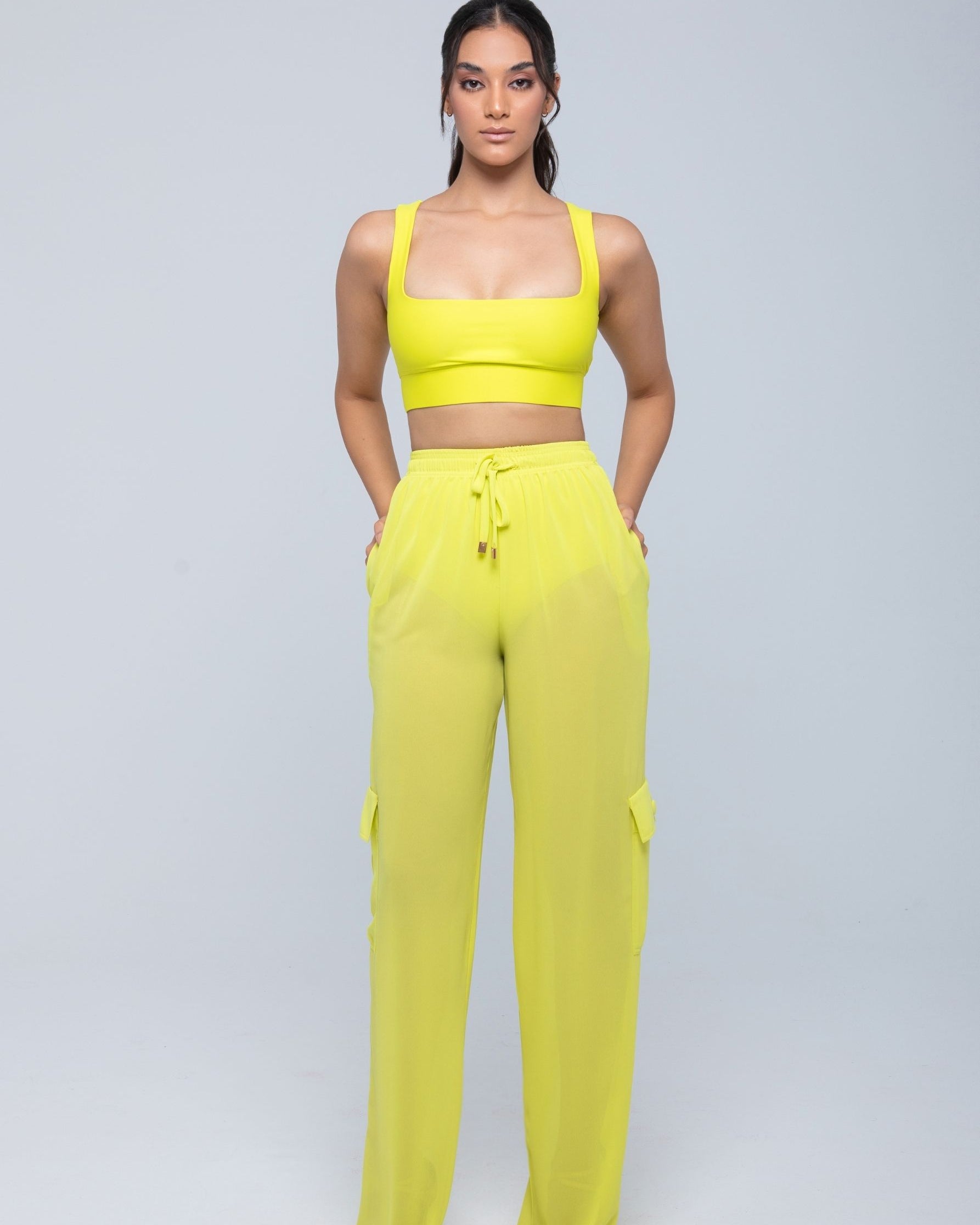 Lightweight sheer pants styled as swimwear cover-up for summer nights