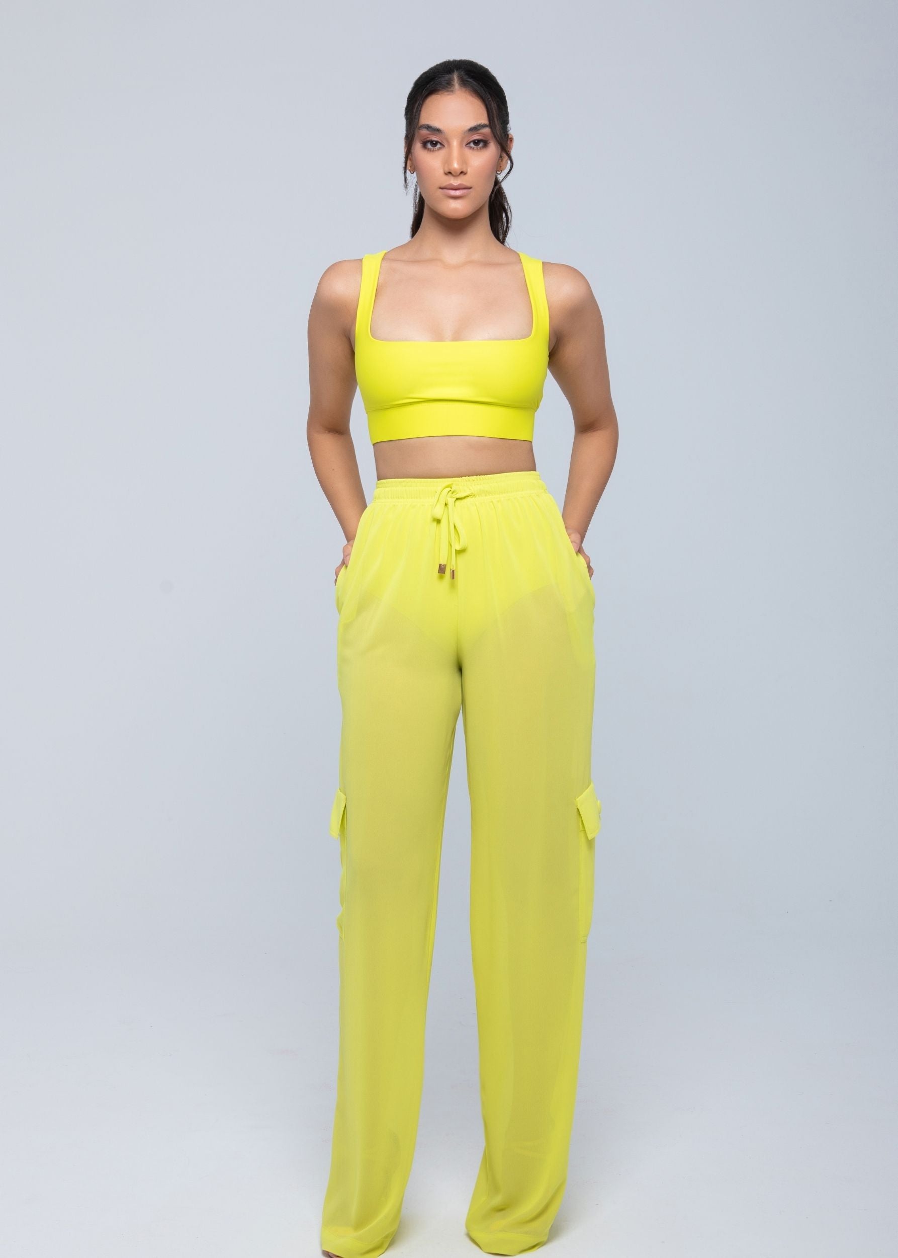 Lightweight sheer pants styled as swimwear cover-up for summer nights