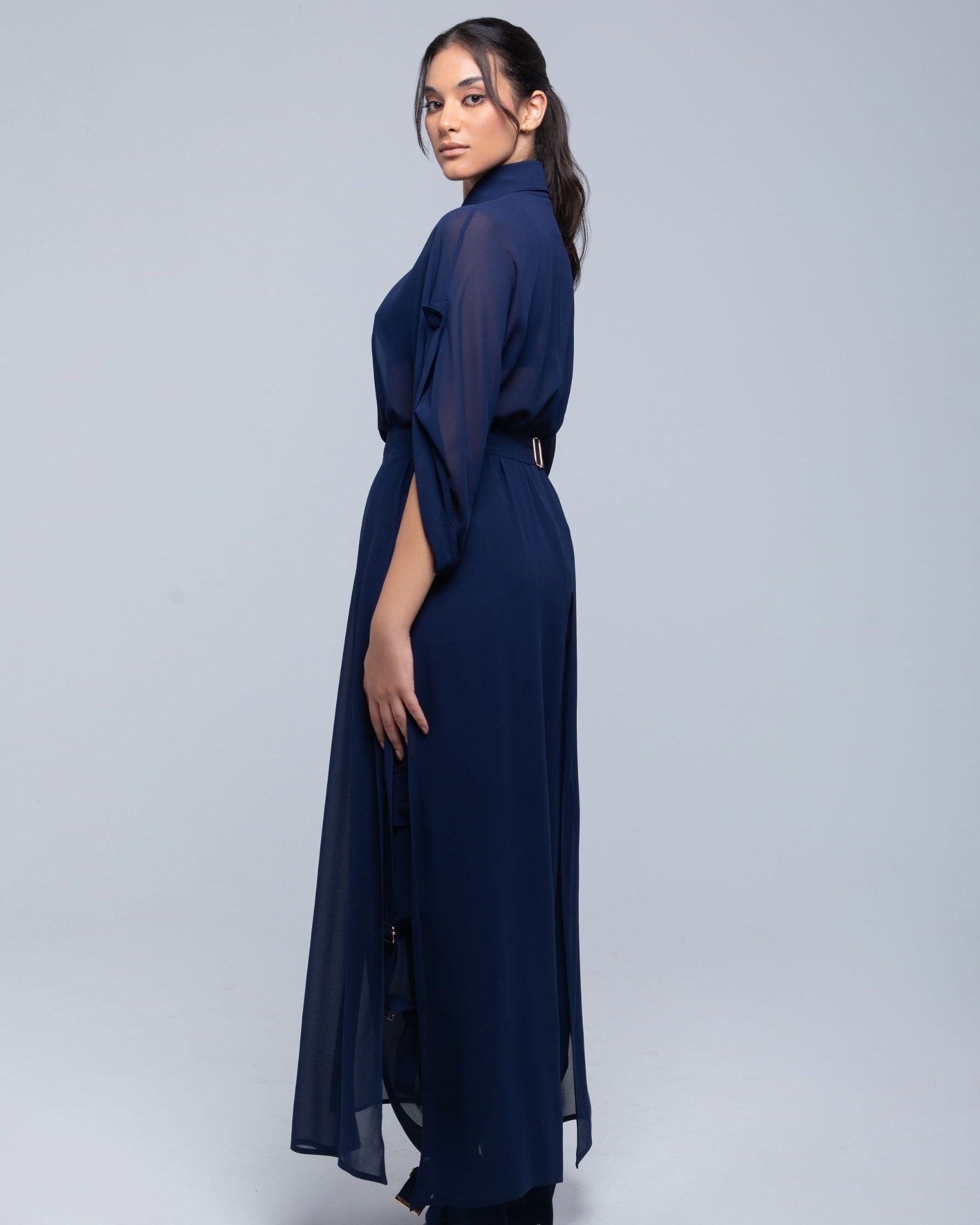 Lightweight sheer pants styled as swimwear cover-up for summer nights