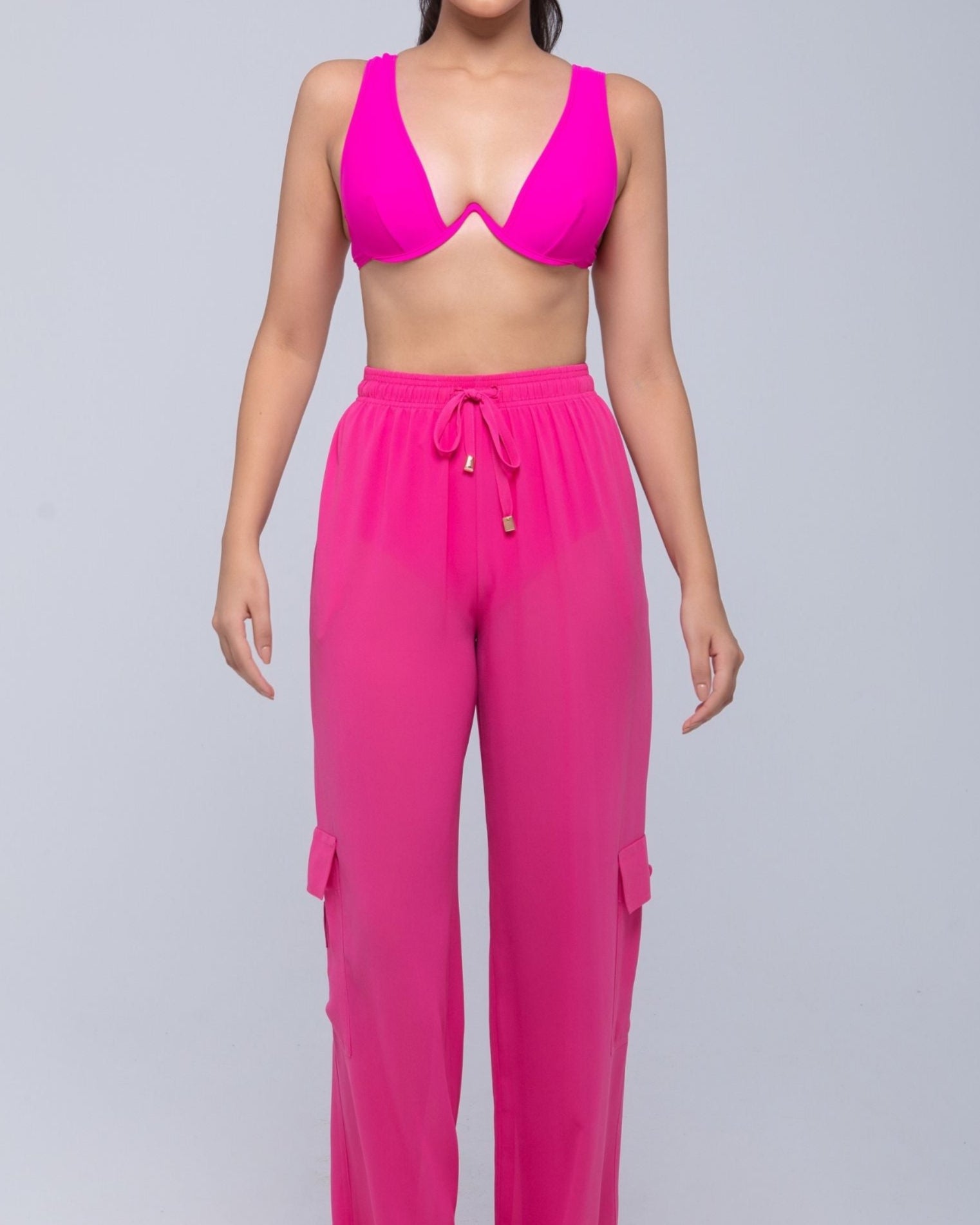 Lightweight sheer pants styled as swimwear cover-up for summer nights