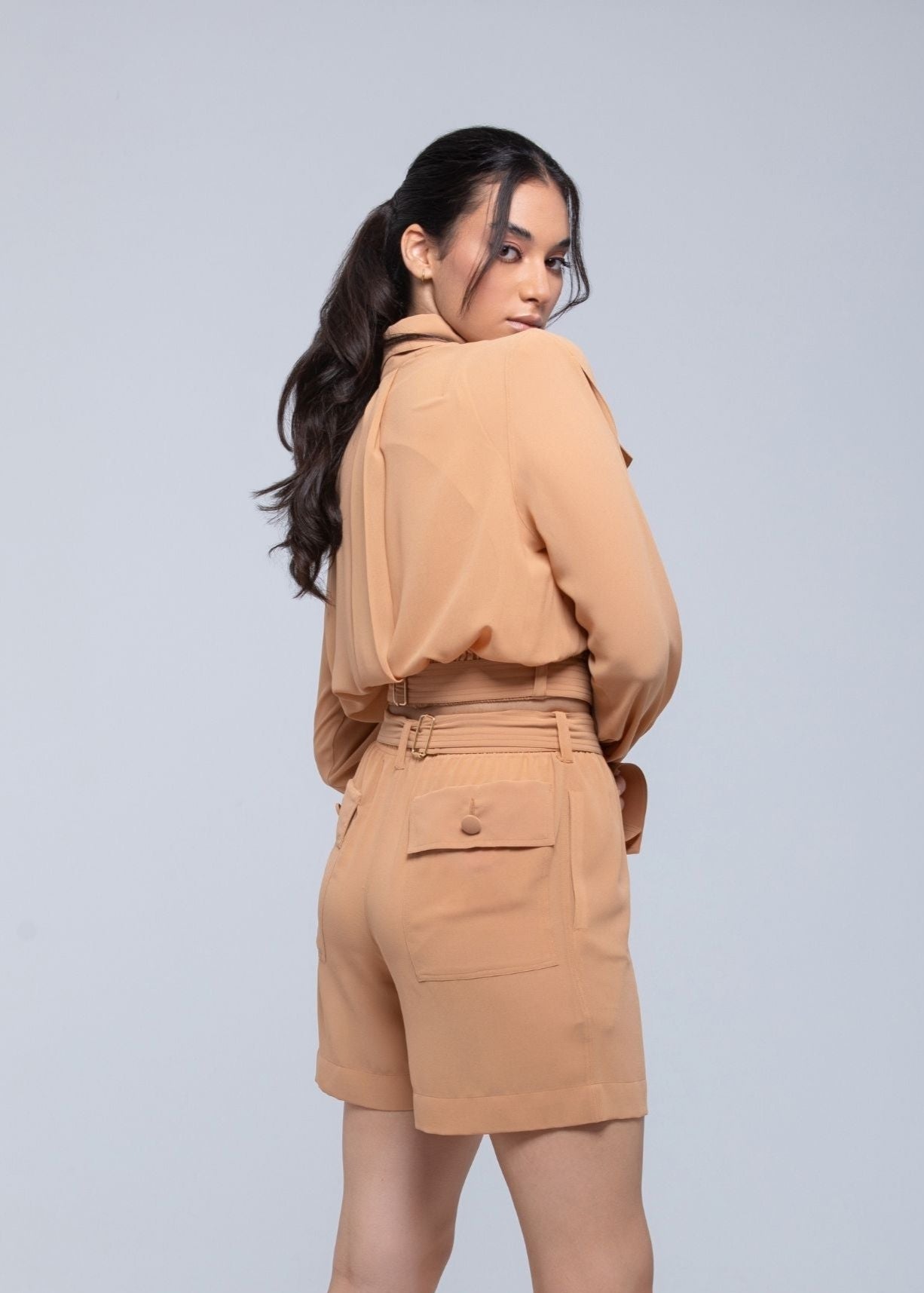 Sheer lightweight shorts with removable gold-detailed belt and pockets