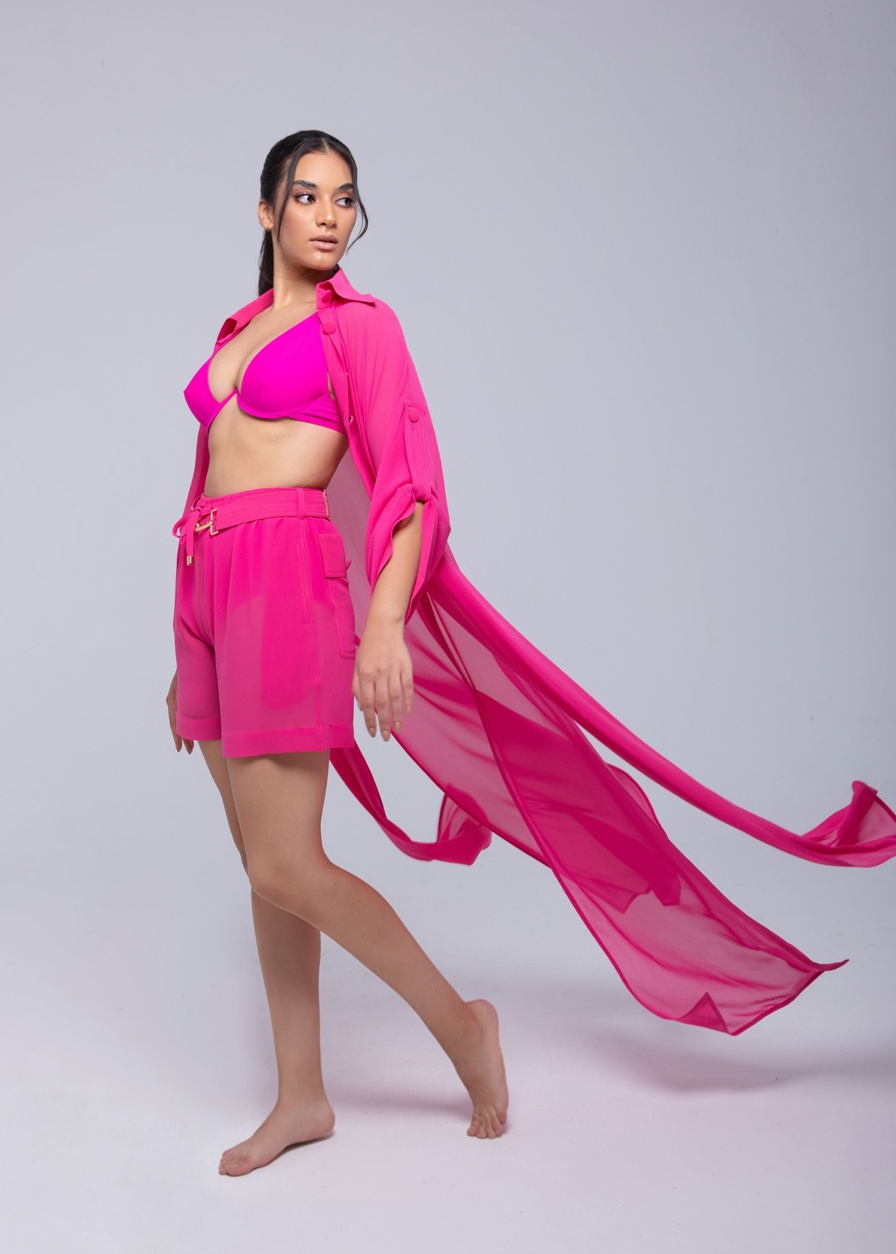 Sheer lightweight shorts with removable gold-detailed belt and pockets