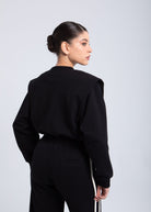 Elite snap-front structure jacket black back view clean silhouette