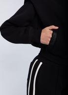 Elite snap-front structure jacket black close-up snap buttons and ribbed cuff