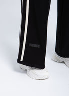 Women’s wide-leg fleece pants with side stripe detail