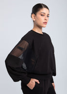 Oversized black mesh sweatshirt front view