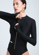 UV-protected one-piece swimwear with thumb holes and sleek design