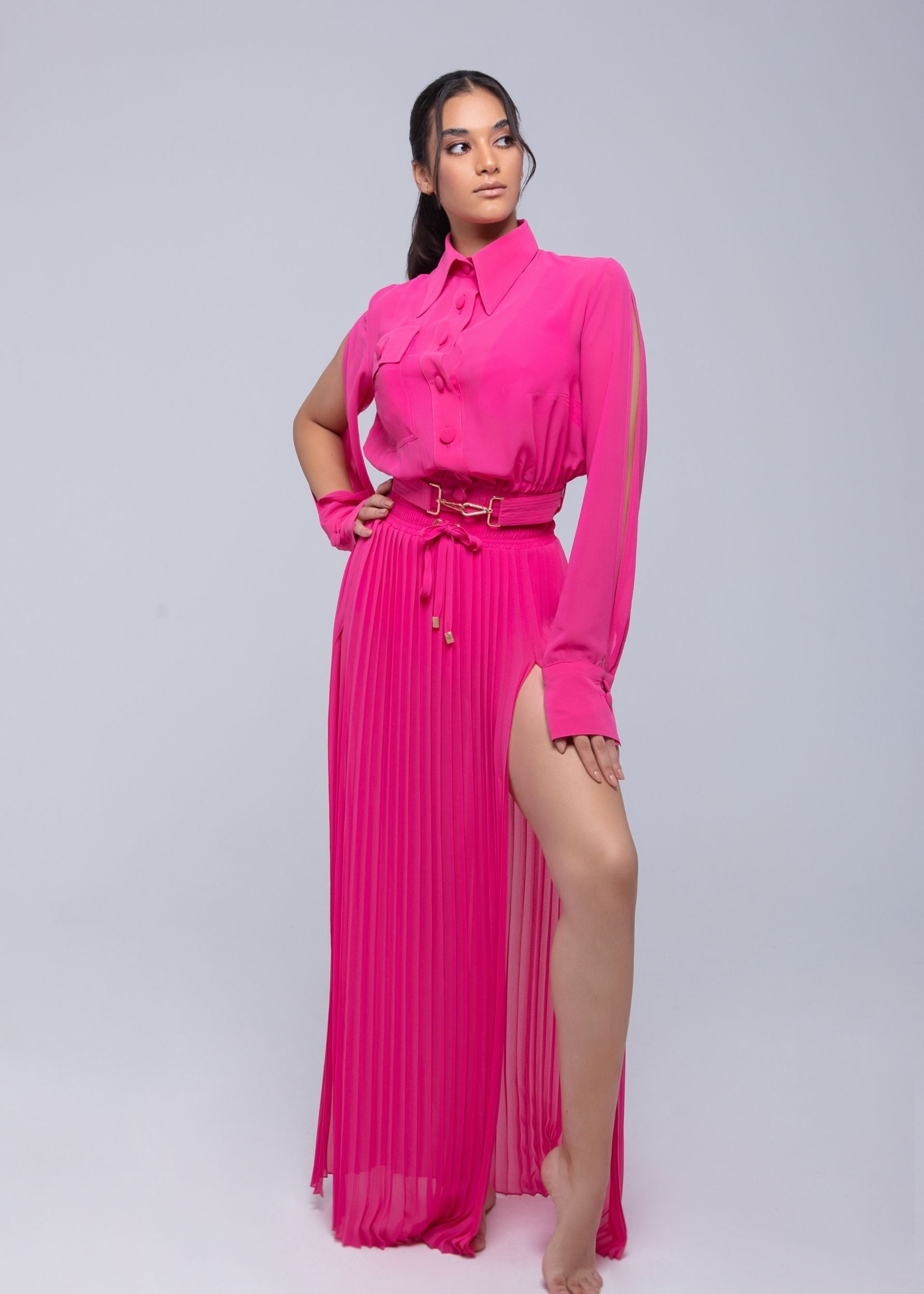 Sheer Jacket with button front, sleeve slits, and gold-accented b