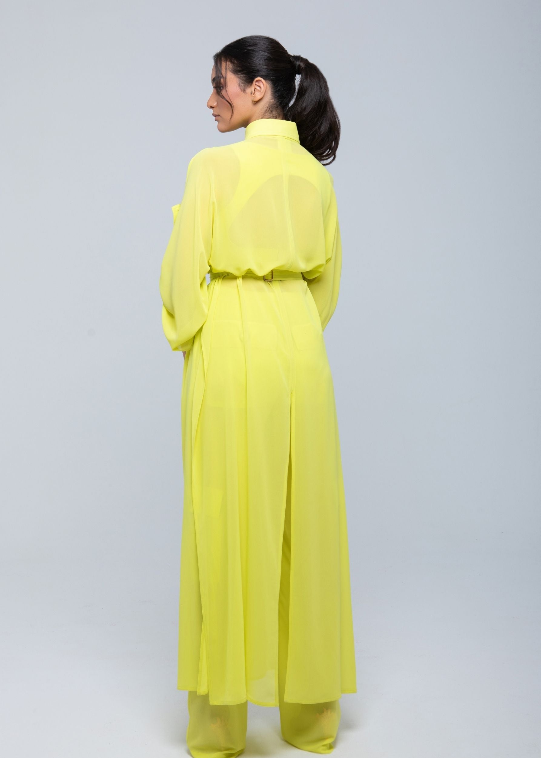 Sheer Maxi Shirt with gold-accented belt and adjustable sleeves