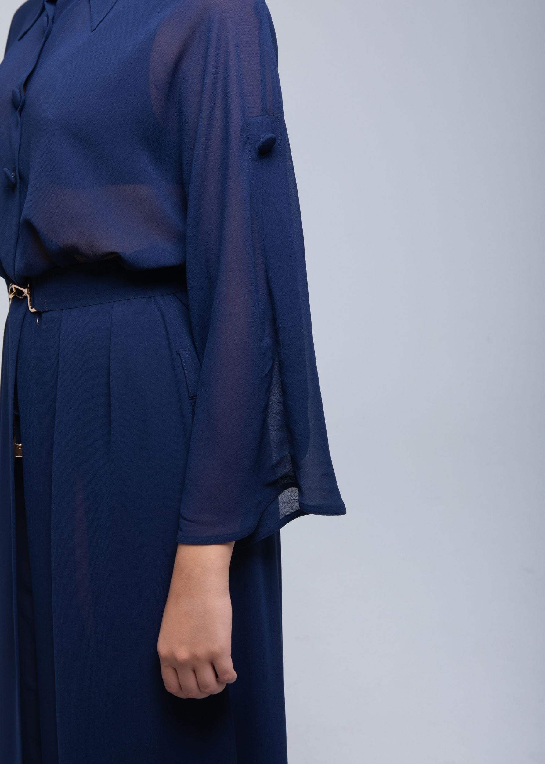 Sheer Maxi Shirt with gold-accented belt and adjustable sleeves