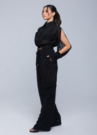 Lightweight sheer pants styled as swimwear cover-up for summer nights