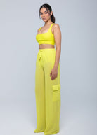  Lightweight sheer pants styled as swimwear cover-up for summer nights