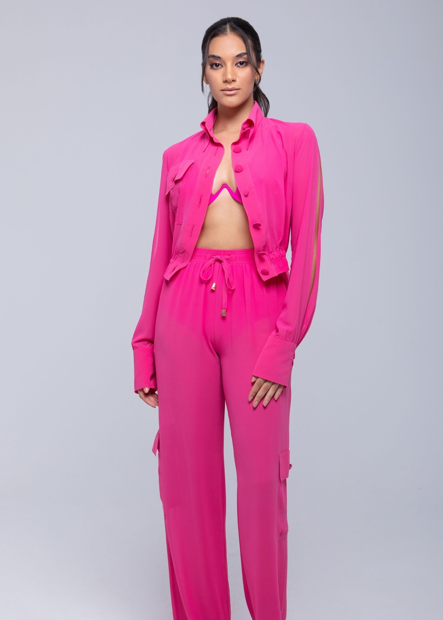 Lightweight sheer pants styled as swimwear cover-up for summer nights