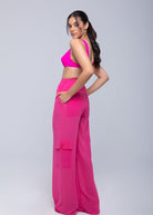 Lightweight sheer pants styled as swimwear cover-up for summer nights