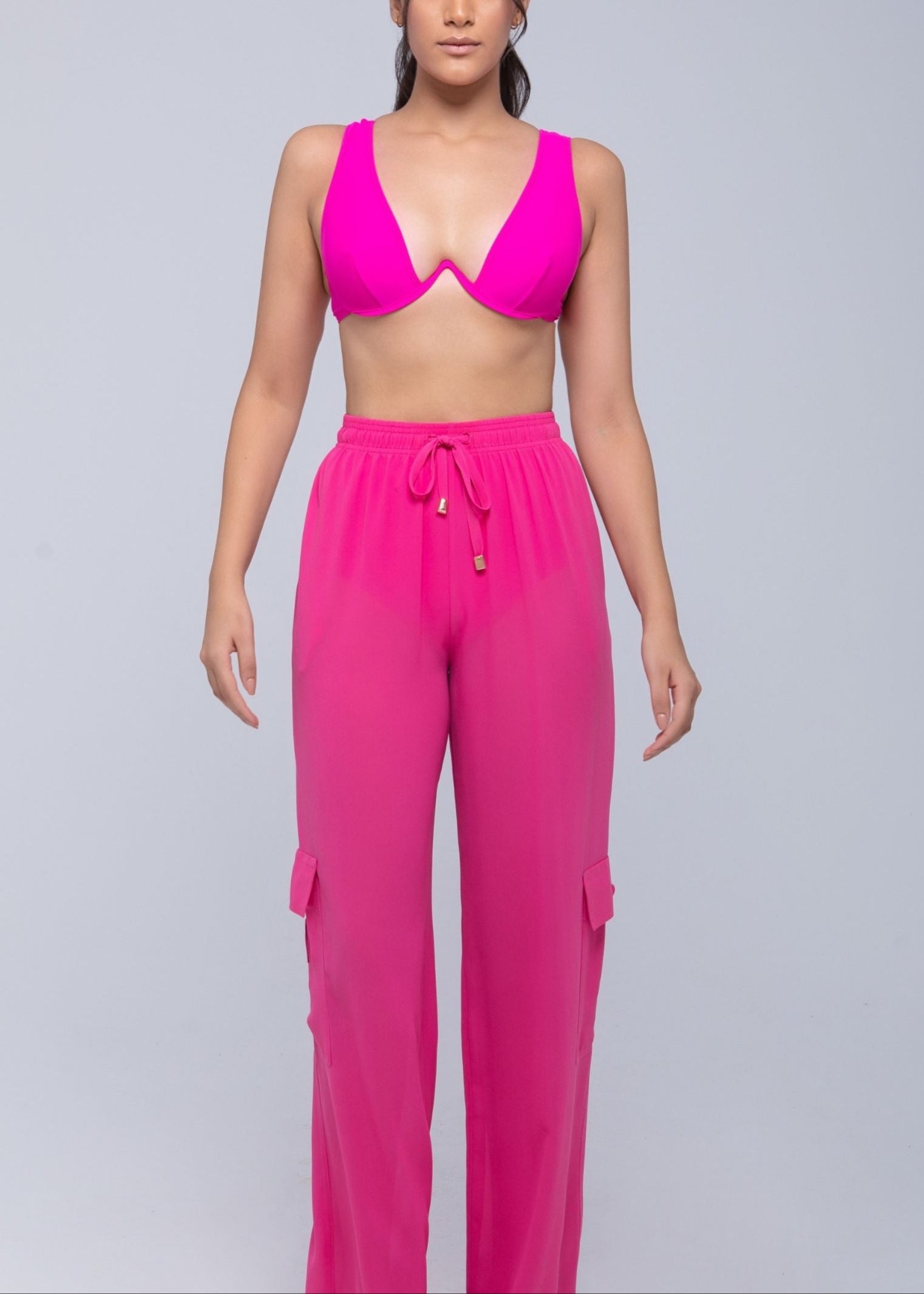 Lightweight sheer pants styled as swimwear cover-up for summer nights